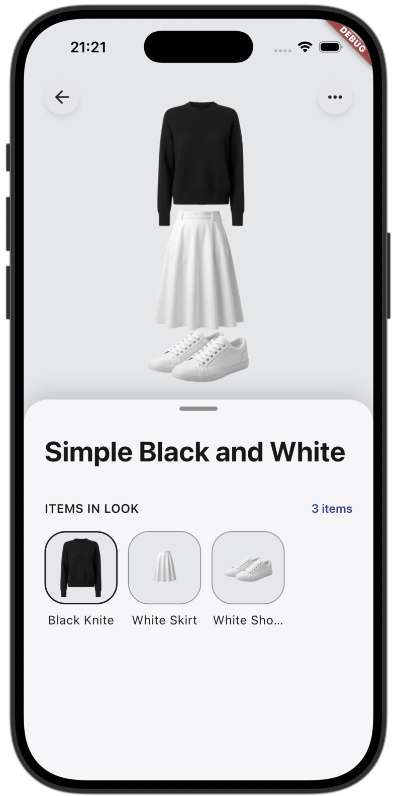 Wardrobe+ outfit overview showing a black knit, white skirt, and white sneakers.